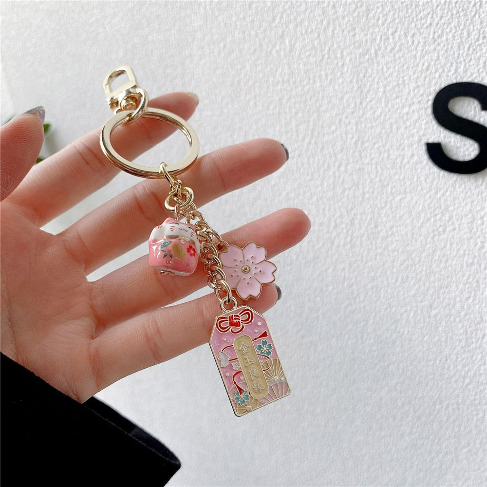 Omamori Sakura Amulet Lucky Cat Keychain Accessories by The Kawaii Shoppu | The Kawaii Shoppu