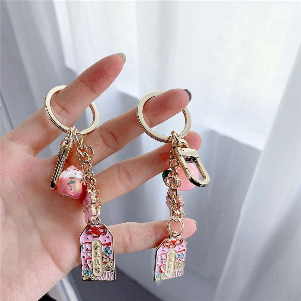 Omamori Sakura Amulet Lucky Cat Keychain Accessories by The Kawaii Shoppu | The Kawaii Shoppu