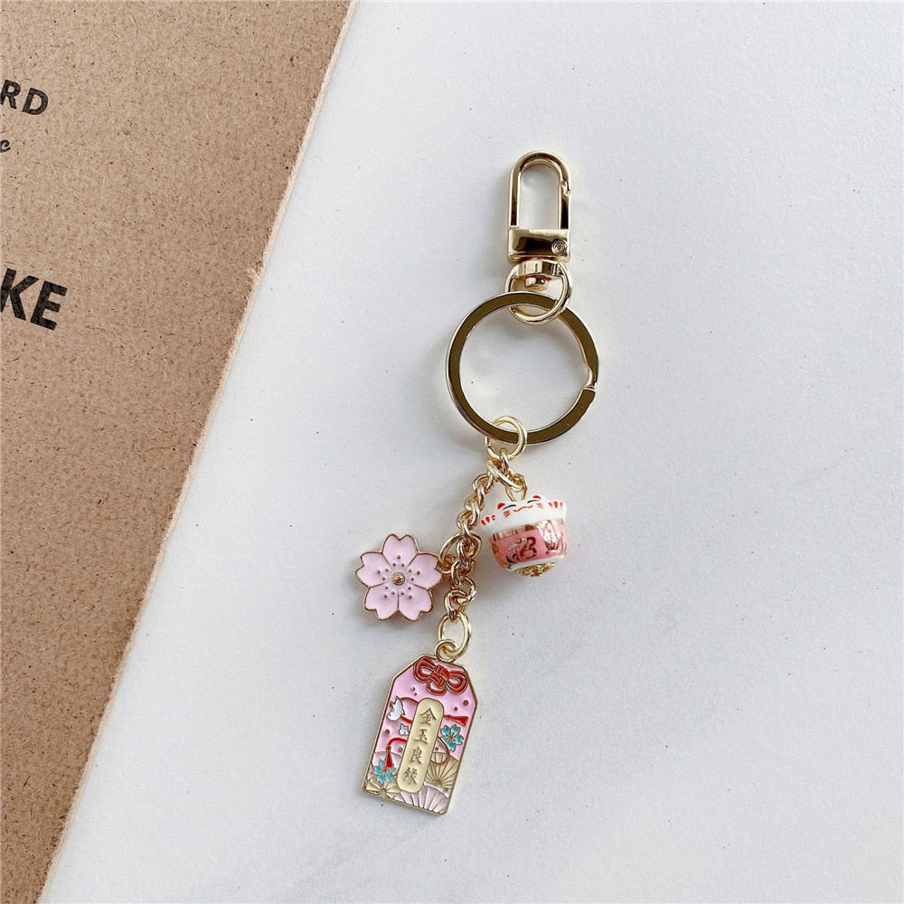 Omamori Sakura Amulet Lucky Cat Keychain Fortune Cat Accessories by The Kawaii Shoppu | The Kawaii Shoppu