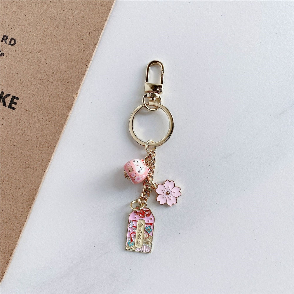 Omamori Sakura Amulet Lucky Cat Keychain Lucky Cat Accessories by The Kawaii Shoppu | The Kawaii Shoppu